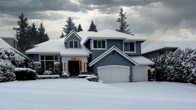 house with snow covered yard scene