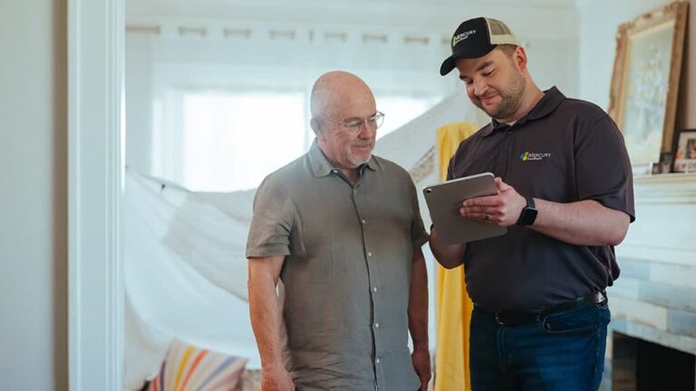 Mercury service technician explaining fiber and home internet services