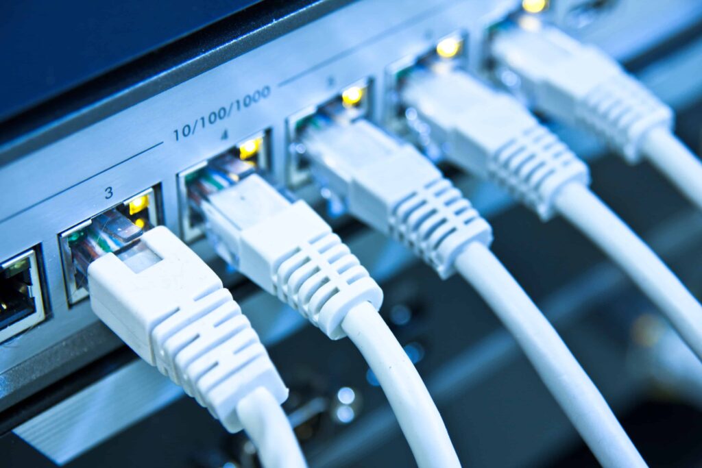 Router with network cables connected to switch