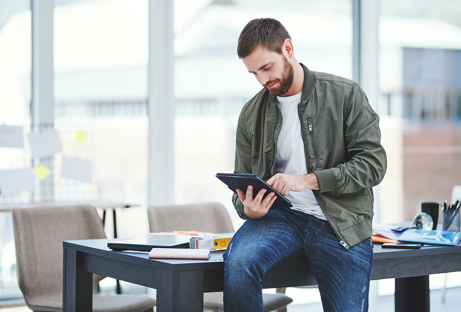 A man working using a tablet