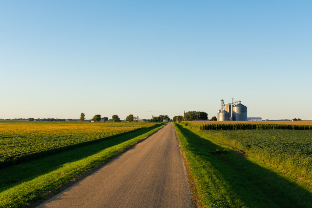 rural landscape with silos in distance