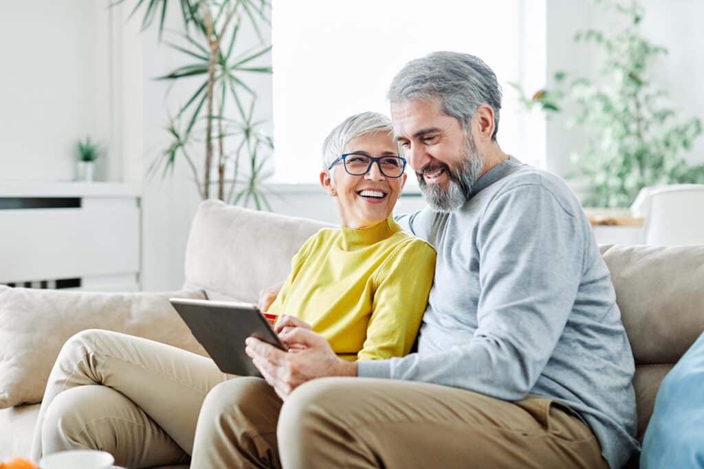 Senior couple with a tablet